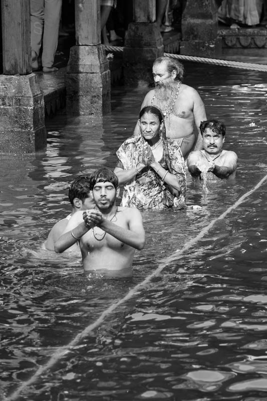 The connection between Water and Religion - Devotees engaged in Kumbh Snan at Kushavarta Ghat, Trimbakeshwar during Nashik Kumbh, Maharashtra